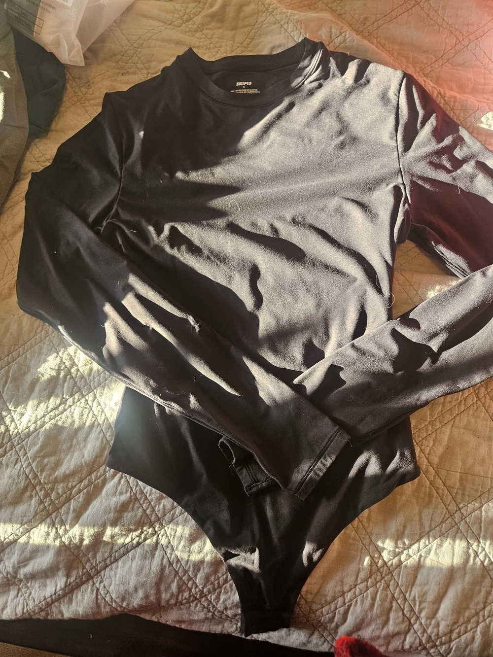 SKIMS Black Long-Sleeve Bodysuit
